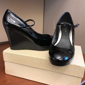 Black patent leather wedge shoes